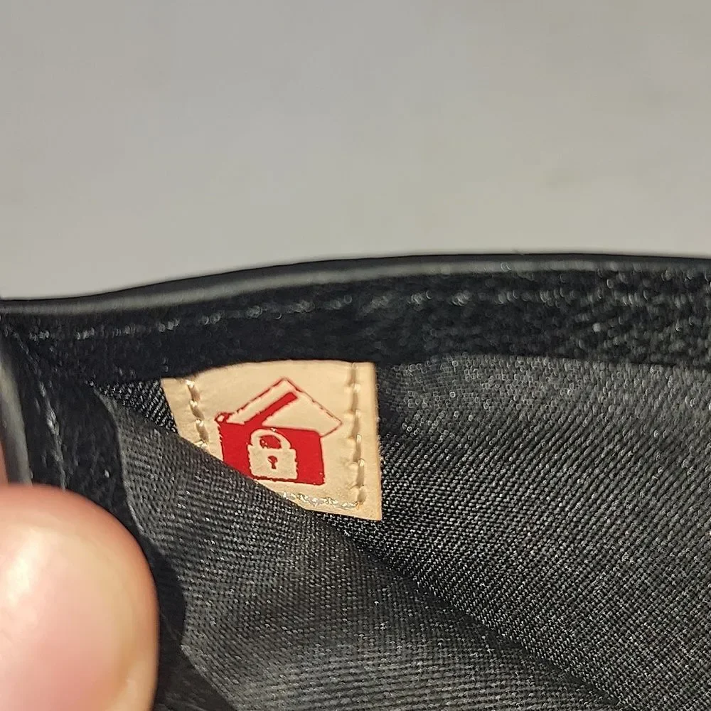TUMI Delta Global - ID Lock Shielded Double Billfold Wallet